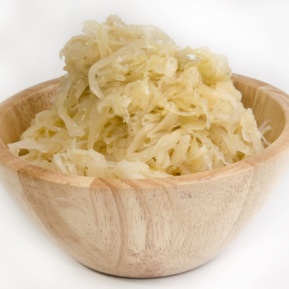 Homemade Sauerkraut In A Wooden Bowl